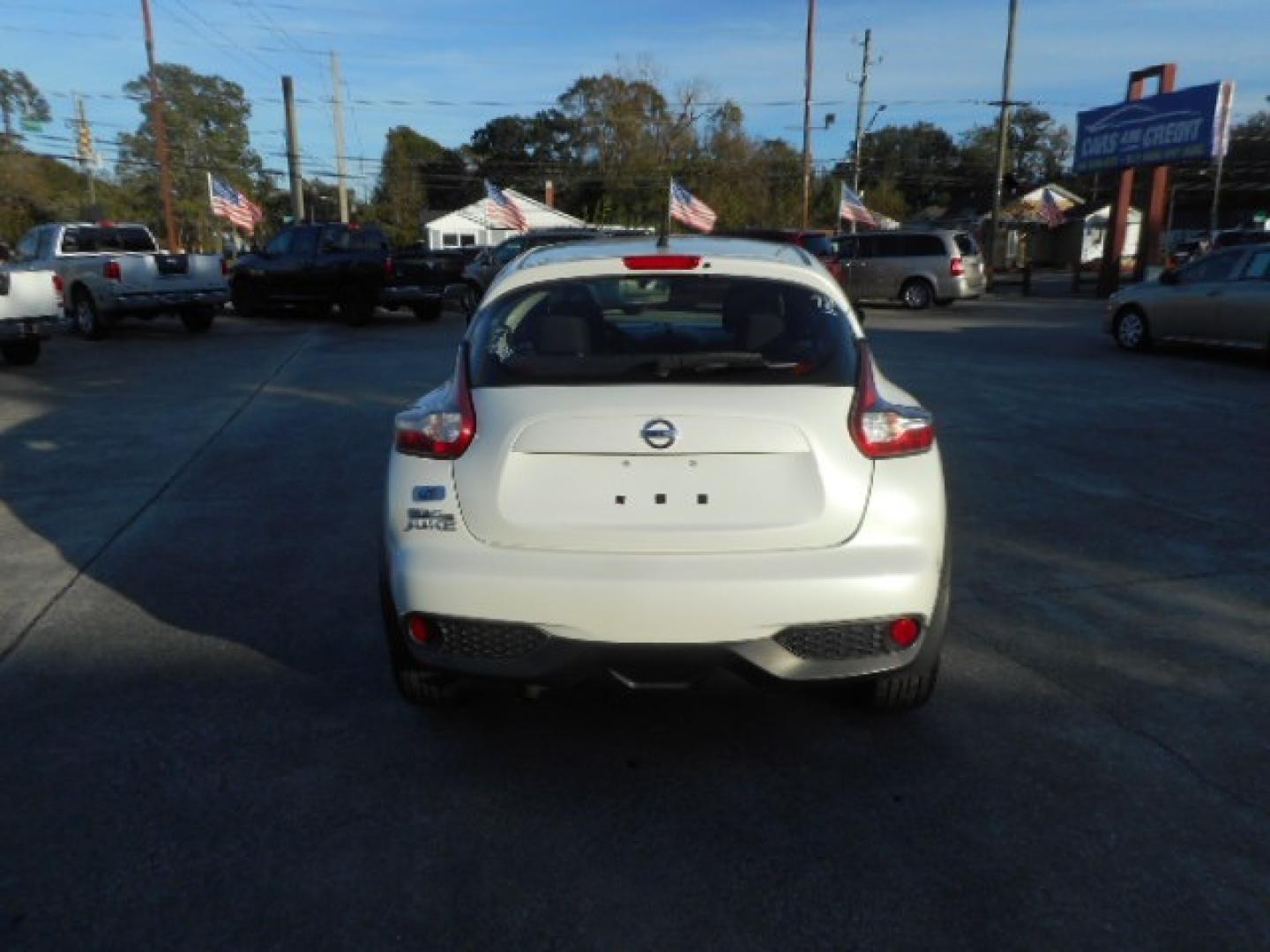 2016 WHITE NISSAN JUKE S; SL; SV; NISM (JN8AF5MR5GT) , located at 10405 Abercorn Street, Savannah, GA, 31419, (912) 921-8965, 31.988262, -81.131760 - Photo#4